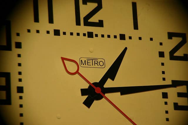 Image of a metro clock, via flickr user Dave Stokes
