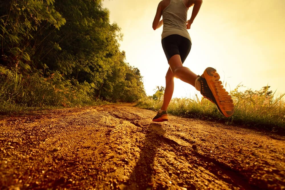 Woman running on a trail