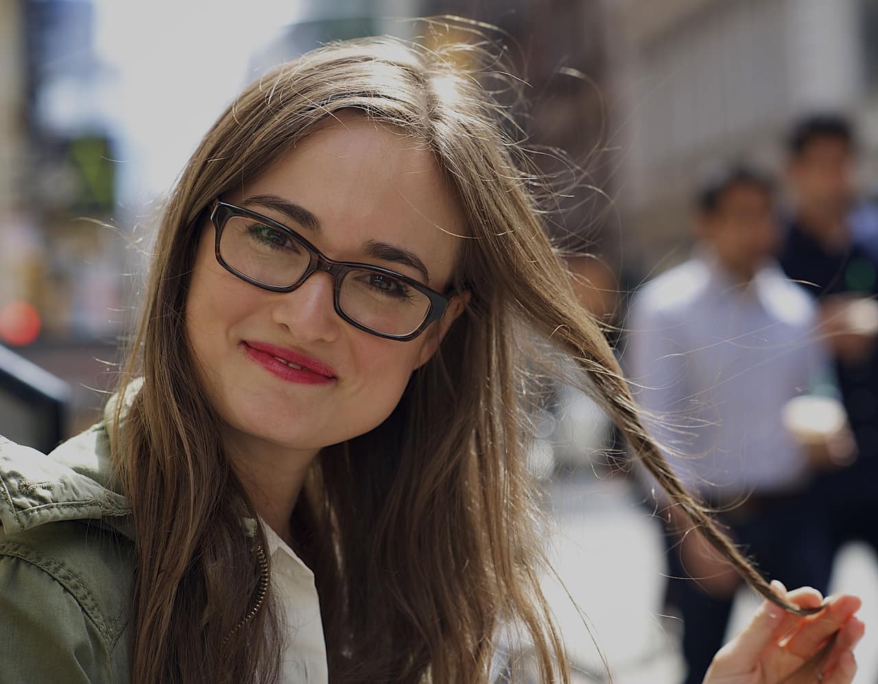smiling woman wearing glasses