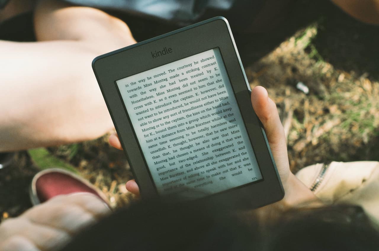 Man Reading Kindle