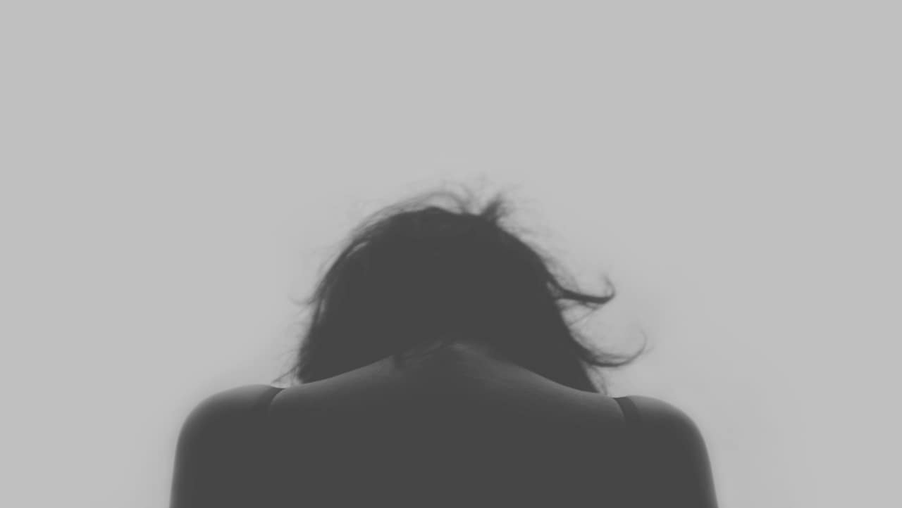 Back profile of girl looking down