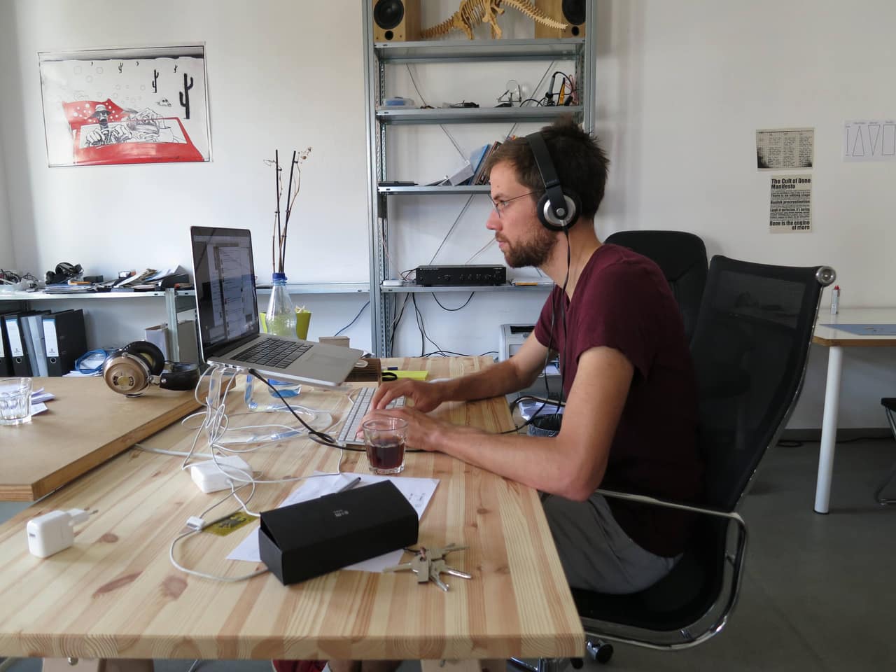 a software developer coding on his laptop