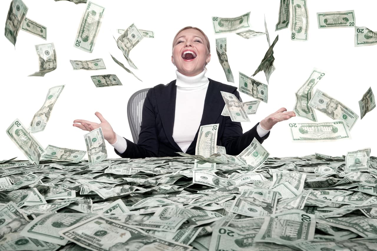 Lady surrounded by money