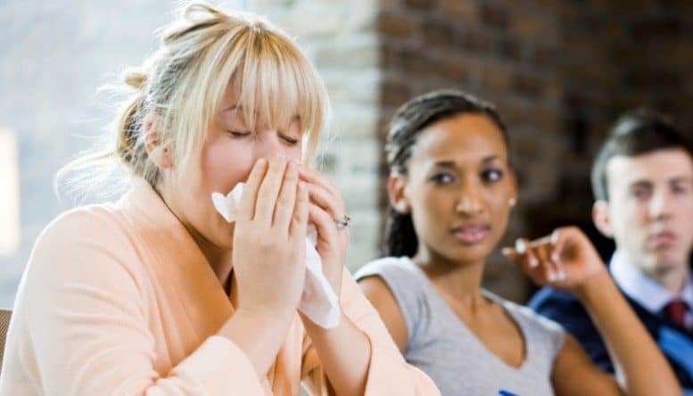 woman sick at work