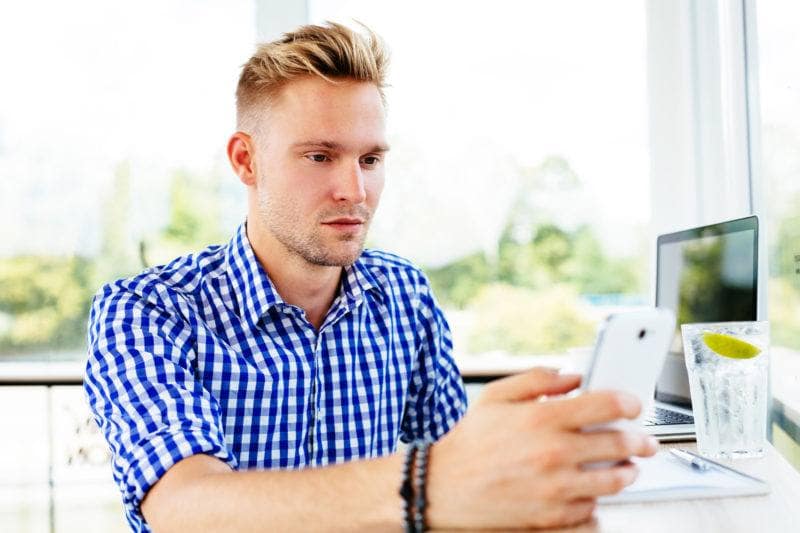 Photo of a young attractive man having a video call