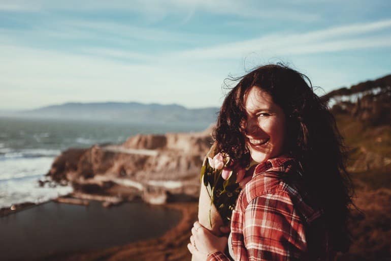 Woman smiling on the beach