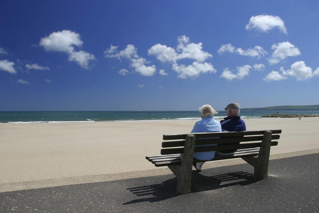 Senior couple relaxing at the seaside