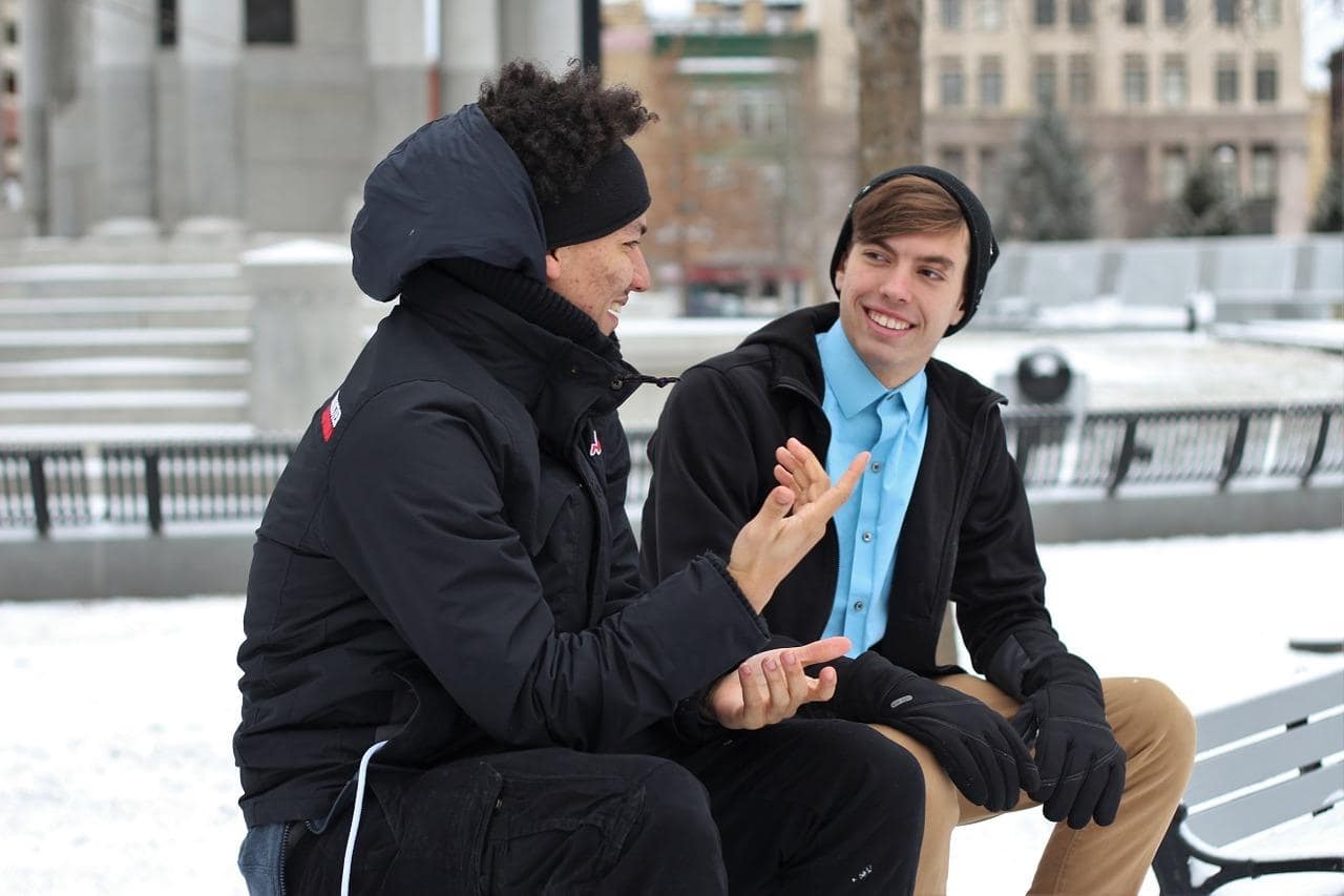 Two men talking