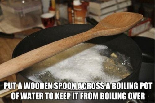 ut a wooden spoon across a boiling pot