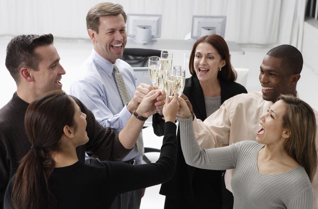 Business Associates Toasting Champagne