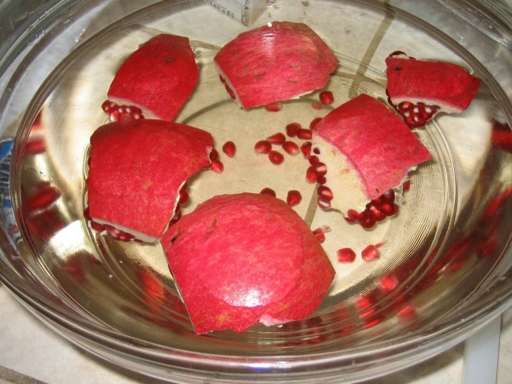 Deseeding pomegranate in water