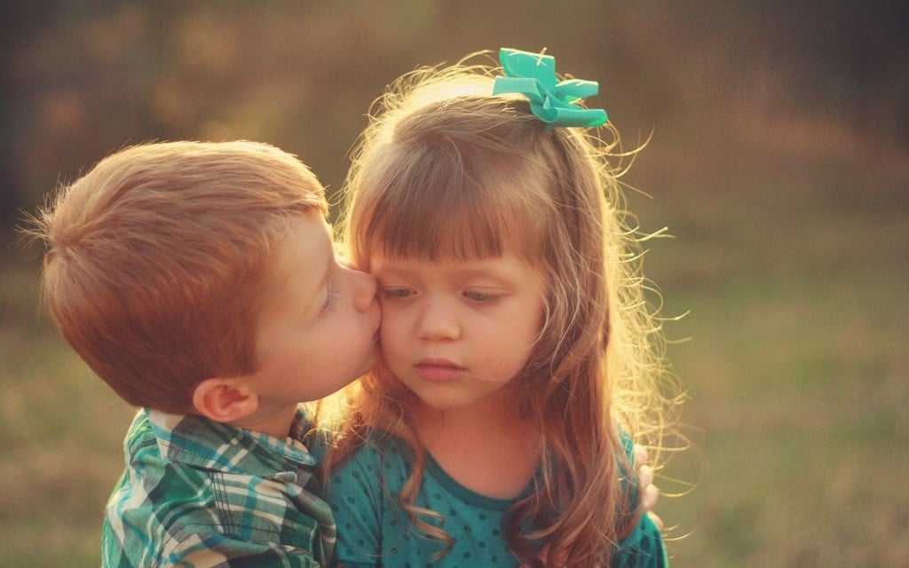 boy-girl kiss on cheek