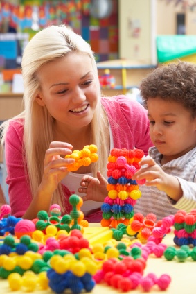 mother and child deeply engaged in learning task