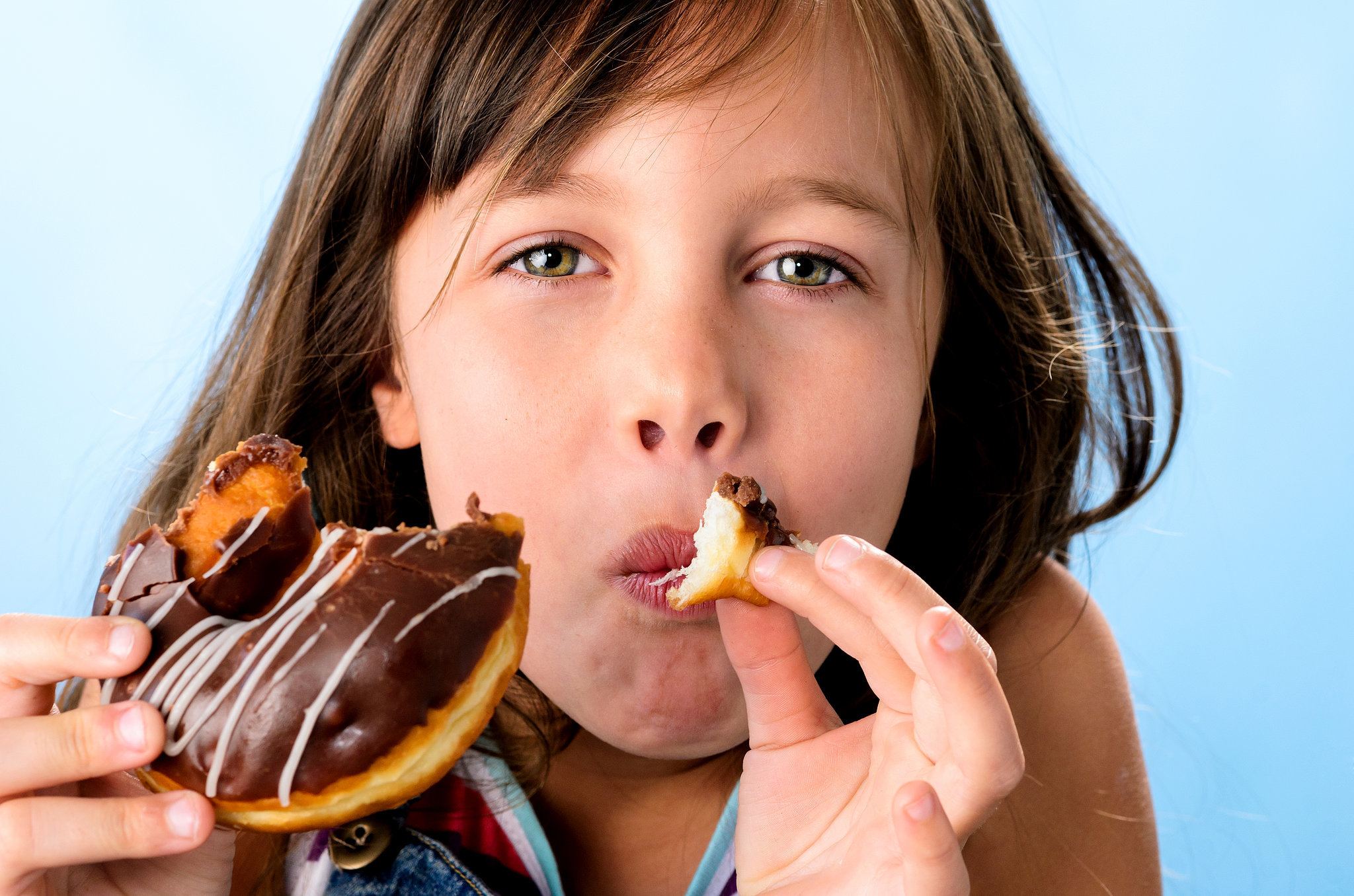 Girl eating doughnut