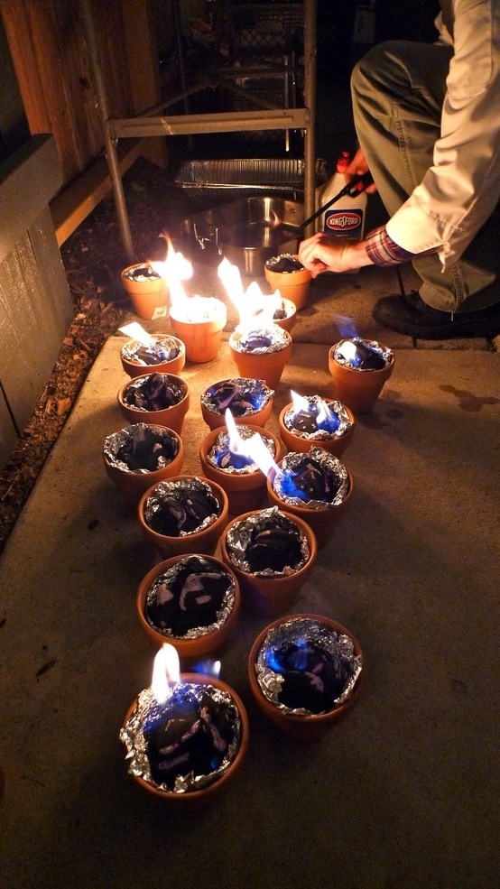 charcoal in terracotta pots