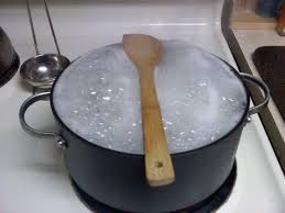 wooden spoon and boiling water