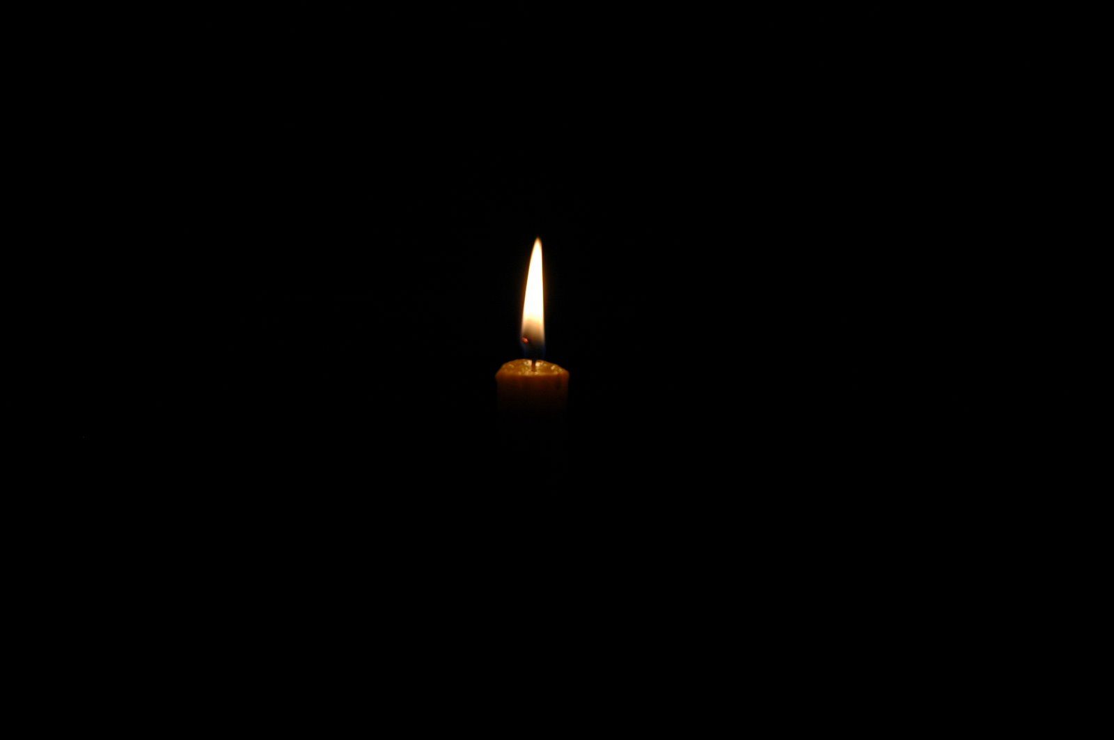 Candlelight in darkness
