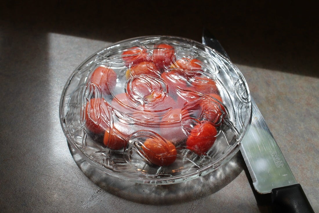Plates and cherry tomatoes
