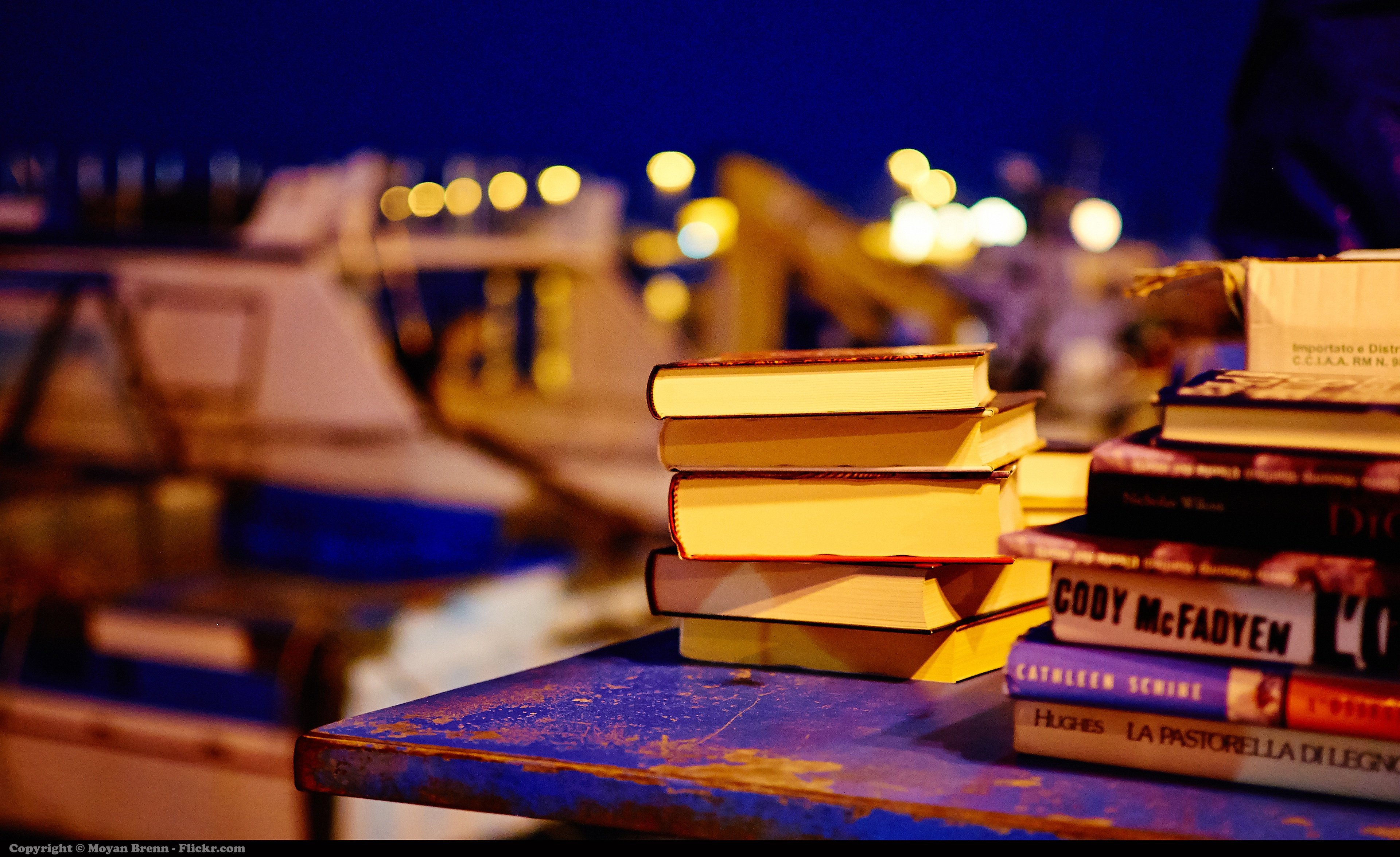 books lying on the table night view