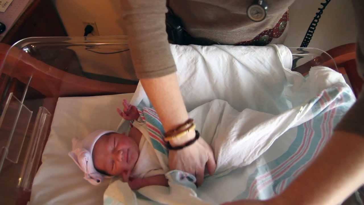 Video: How To Swaddle A Crying Baby