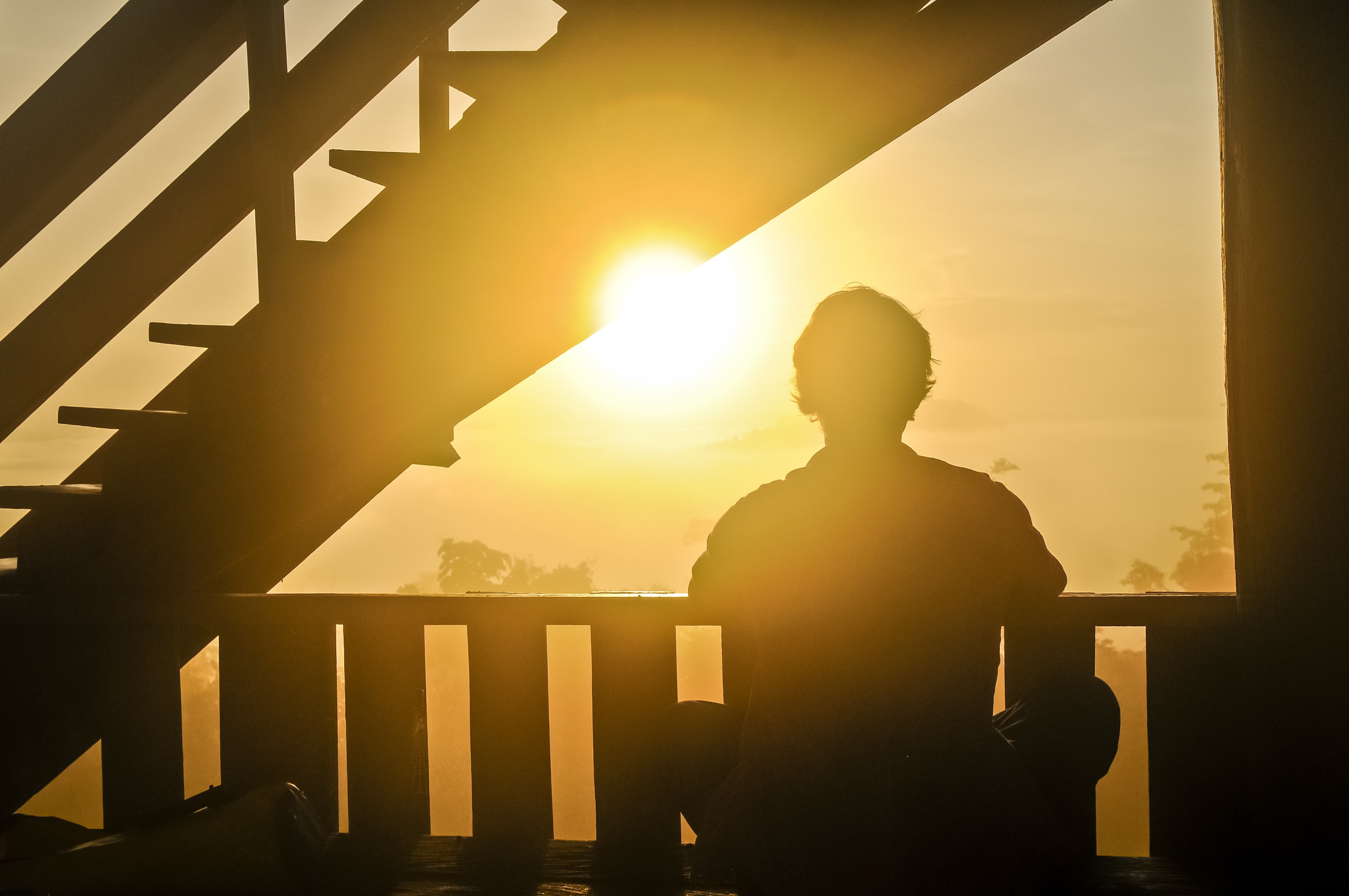 Man Watching Sunrise On Baconey-min
