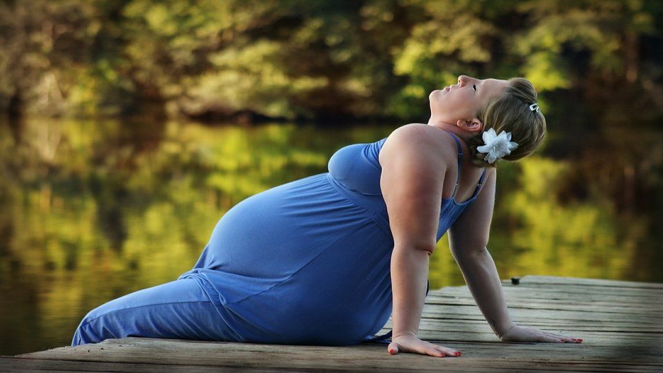 pregnant lady in blue dress