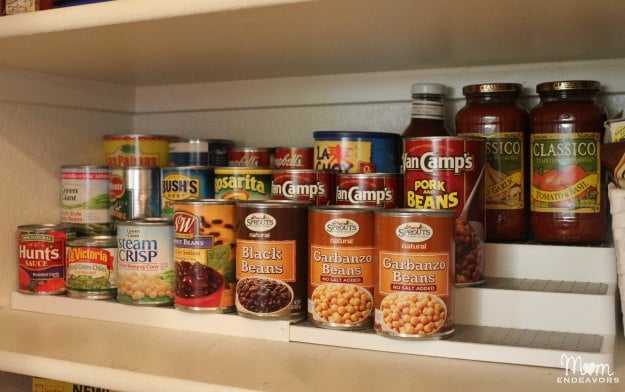 Use stacked shelving to see your cans better in the pantry.