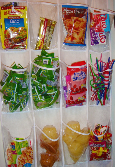 Use a wall pocket organizer to store small snacks