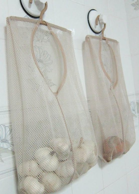 Hang mesh laundry bags in your pantry for onions, potatoes and garlic