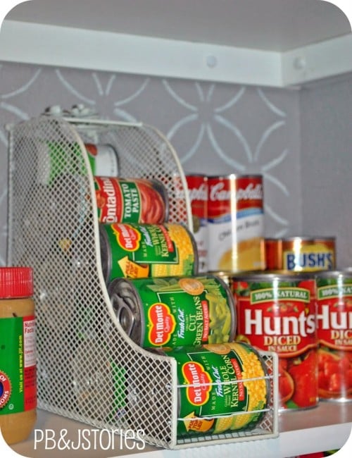 Use a magazine rack to store cans
