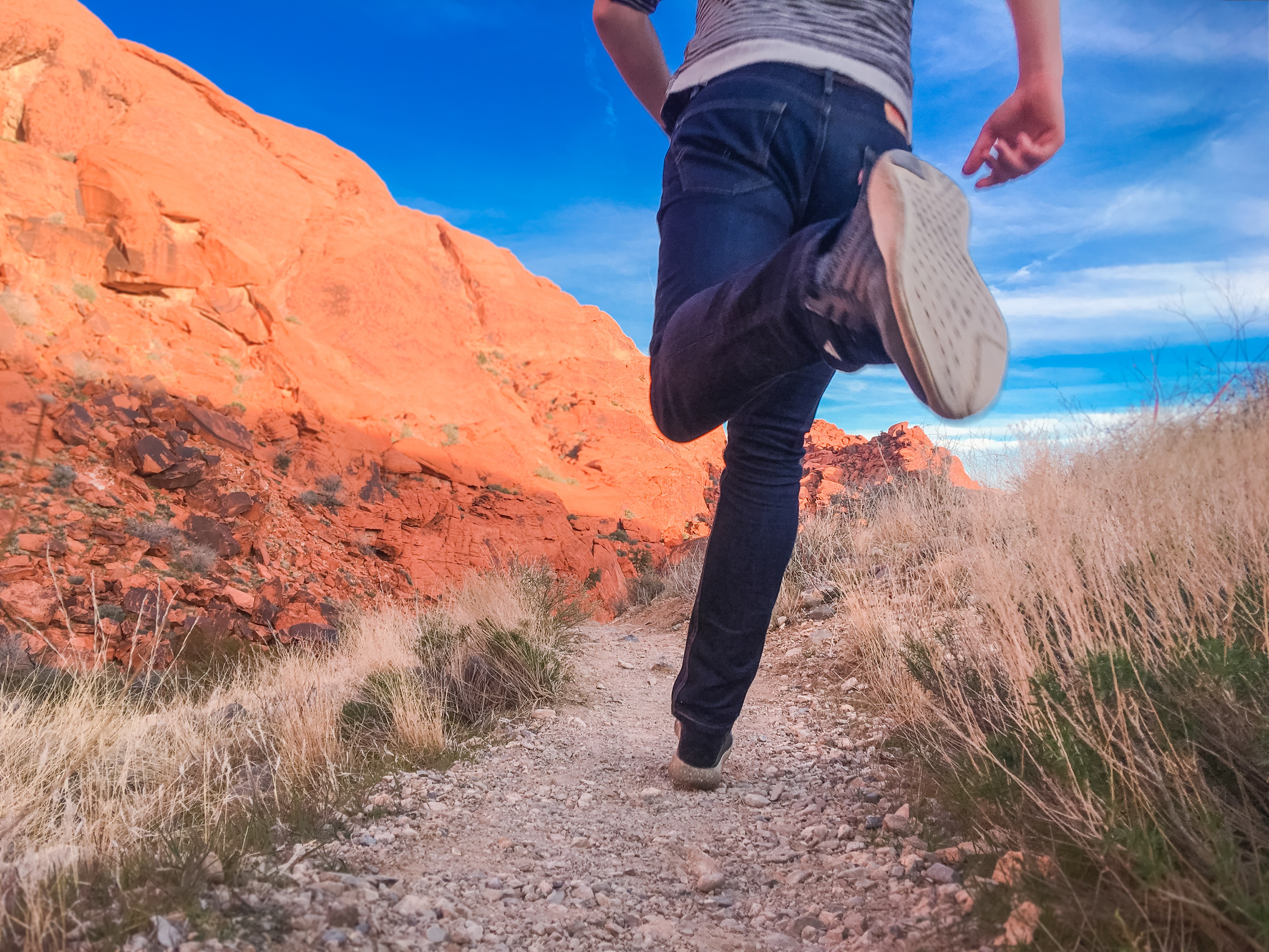 Man Running Outside Along Desert Trail