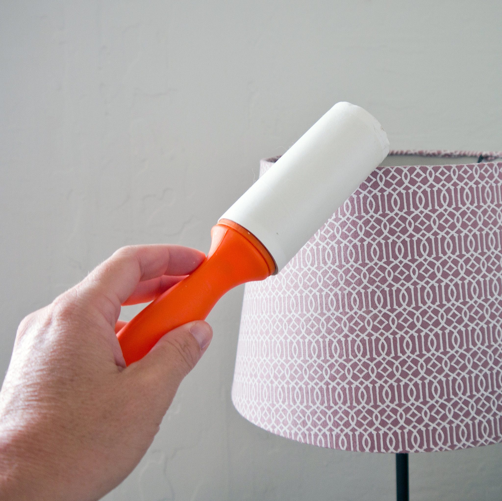 Lint roller to clean lampshade