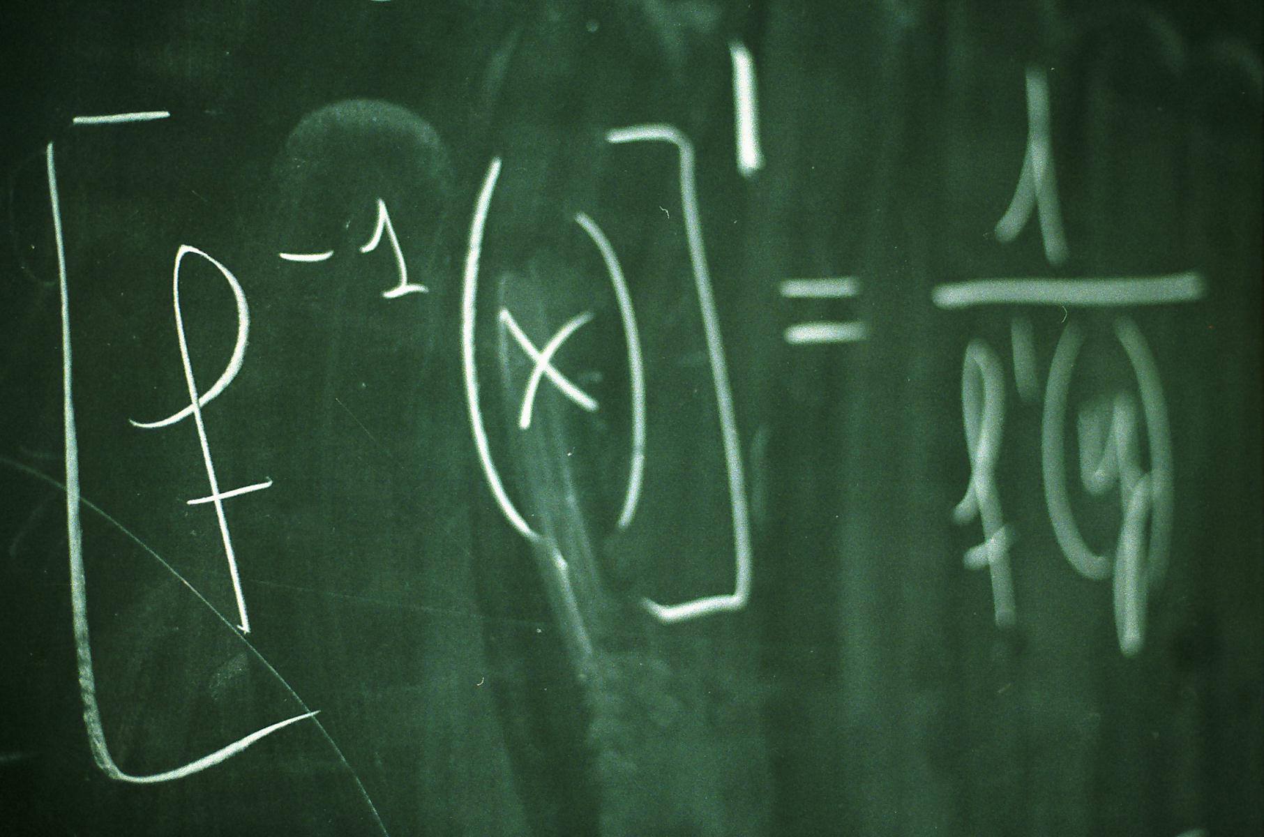 Formula written on chalkboard