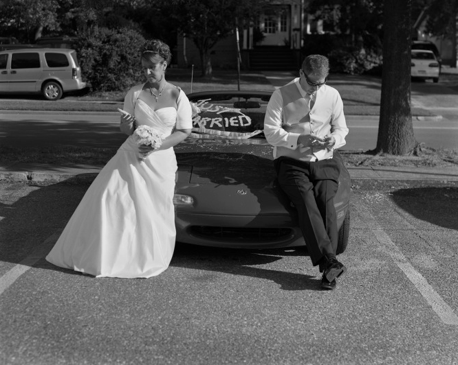 Just_married_without_phones_by_Eric_Pickersgill