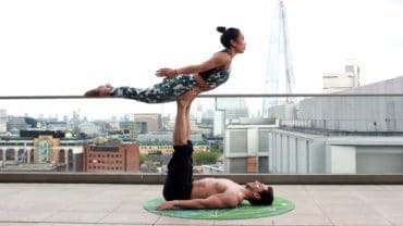 6 Compelling Reasons to Try Couples Yoga (And the Best Poses to Try)
